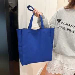 Blue canvas tote bag large capacity single shoulder commuter bag casual solid color fashion design