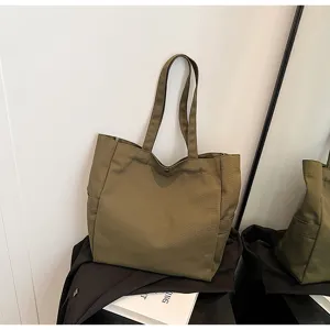 Canvas tote bag for women, large capacity shoulder bag, casual solid color commuting bag.