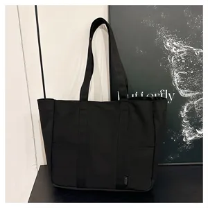 Black canvas tote bag for women, large capacity casual shoulder bag, daily commuting bag.