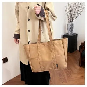 Casual khaki canvas tote bag for women, large capacity shoulder bag for daily commuting.