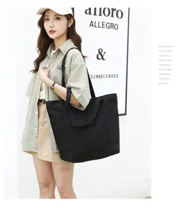 Sac cabas classique en toile noire pour femmes, grand sac d'épaule pour le travail et le shopping.
