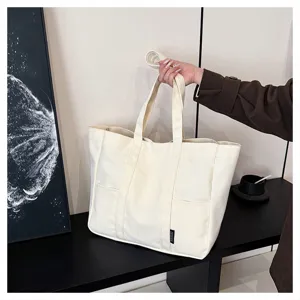 Large capacity canvas tote bag for women, Japanese style casual commuter shoulder bag for daily use.