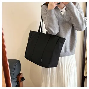 Japanese style large capacity black canvas tote bag for women daily commute casual shoulder bag.