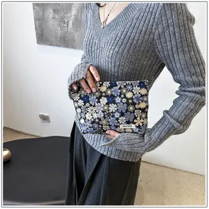 Floral print cosmetic bag compact portable makeup pouch stylish hand bag for daily travel use.