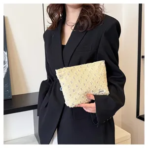 Portable linen cosmetic bag with distressed details, stylish travel makeup pouch for women daily use.