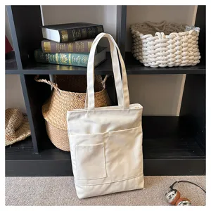 Beige canvas tote bag with multi pockets, large capacity shoulder bag for daily casual use.