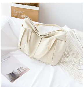 Large capacity casual canvas tote bag for women, minimalist Japanese style shoulder bag.