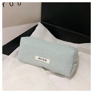 Lichtgroene corduroy etui grote capaciteit esthetische schrijfwaren make-up tas.