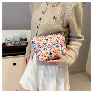 Floral cosmetic bag for women, large capacity makeup pouch with pretty rose print design.