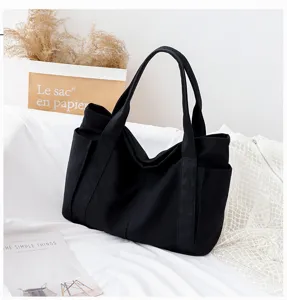 Black canvas tote bag for women, large capacity casual shoulder bag, daily commuting minimalist handbag.