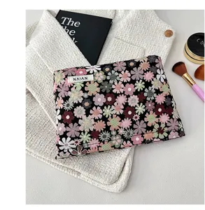 Floral print cosmetic bag, portable makeup pouch, toiletry storage organizer for women.