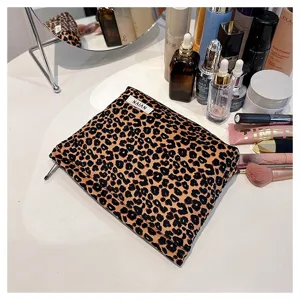Leopard print makeup bag portable cosmetic storage pouch for travel and daily use.