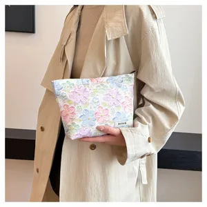 3D floral cosmetic bag, cute pastel makeup pouch, large capacity travel toiletry organizer.