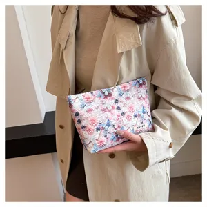 Floral cosmetic bag for women, large capacity makeup pouch with 3d butterfly design for travel.