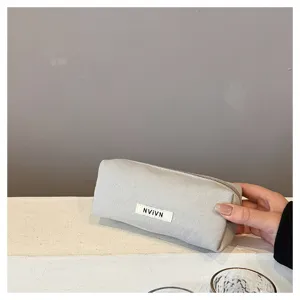 Simple canvas pencil case for students, large capacity stationery storage bag, grey zipper pouch.