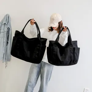 Minimalist Korean fashion large capacity canvas tote bag, versatile casual shoulder handbag.