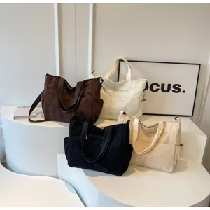 Casual large capacity corduroy tote bag stylish solid color shoulder bag for daily commuting.