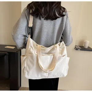 Detail view of the casual corduroy tote bag showing large capacity and multi pockets.