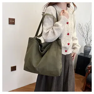 Casual green canvas tote bag for women, large capacity shoulder bag for daily use.