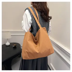 Casual canvas tote bag for women, large capacity minimalist shoulder bag for daily use.