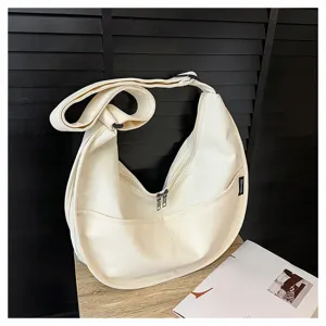 Sac hobo minimaliste en toile blanche, sac bandoulière croissant décontracté pour femme.
