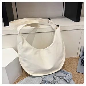 Sac bandoulière décontracté en toile blanche, sac croissant polyvalent pour femmes.