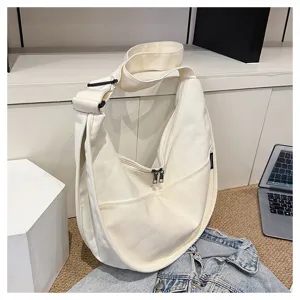Sac bandoulière décontracté en toile pour femme, grand cabas fourre-tout style hobo quotidien.
