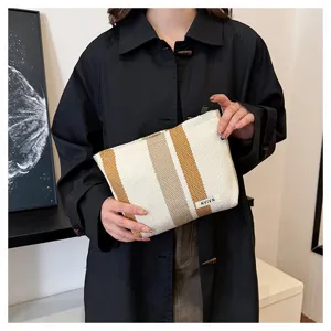 Large capacity striped linen cosmetic bag, portable hand-held storage pouch for daily travel.