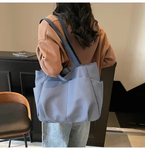 Simple solid color shoulder tote bag with multiple pockets, stylish daily casual handbag.