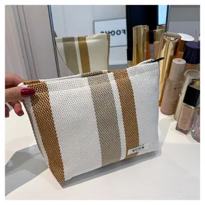 Large capacity striped cosmetic bag, portable linen makeup pouch, travel storage organizer.