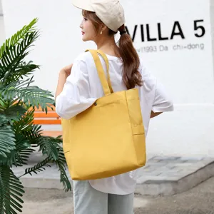 Korean style canvas tote bag for women, casual yellow single shoulder shopping eco bag.
