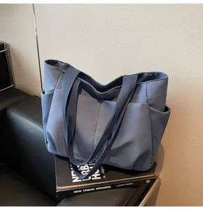 Simple solid color tote bag for women, casual versatile shoulder bag with large capacity.