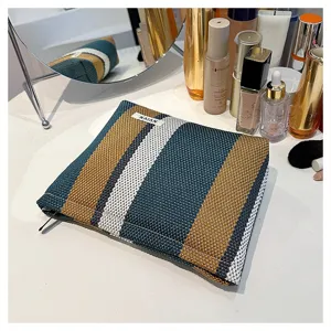 Close-up of the striped linen makeup bag, large capacity portable cosmetic storage pouch.