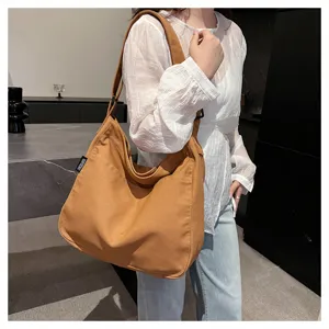 Korean style canvas shoulder bag for women, large capacity daily casual tote and crossbody bag.