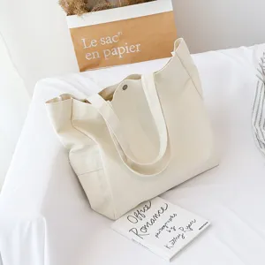 Solid color canvas tote bag for women, casual shoulder shopping bag with sturdy straps.