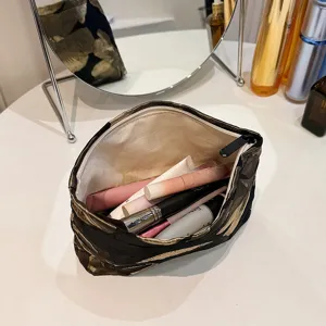 Black and gold floral cosmetic bag, large capacity fabric makeup pouch for travel and daily use.