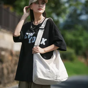Weißer Canvas Umhängetasche für Damen, große Kapazität lässige Schultertasche für Pendeln.
