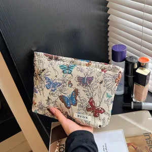 Chic vintage butterfly woven cosmetic bag, large capacity makeup storage pouch for women.