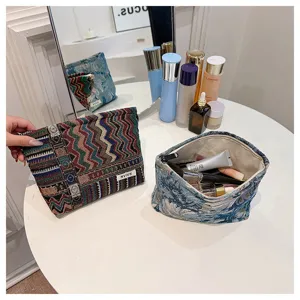 Ethnic style cosmetic bag retro tapestry makeup pouch portable storage bag for women daily use.