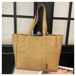 Casual canvas tote bag for women, large capacity shoulder handbag for daily use, khaki style.