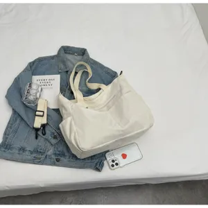 Casual white corduroy tote bag for women, large capacity shoulder bag for daily commute.
