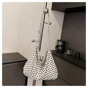 Polka dot shoulder tote bag detail view, casual lazy style canvas handbag for women everyday use.