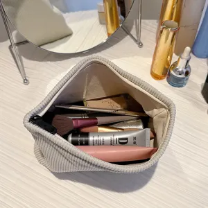 Corduroy makeup bag for women, solid color cosmetic pouch, zipper travel storage bag.