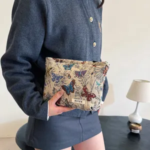 Retro butterfly print linen cosmetic bag, chic casual storage pouch with zipper closure.
