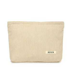 Beige corduroy cosmetic bag for women, solid color makeup pouch and daily storage bag.