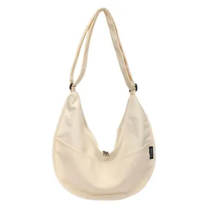 Sac bandoulière hobo en toile décontracté pour femme, grand sac fourre-tout polyvalent chic.