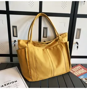 Large capacity yellow canvas tote bag for women, casual single shoulder daily handbag.