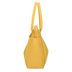 Yellow canvas tote bag for women, large capacity casual shoulder bag with side pocket.