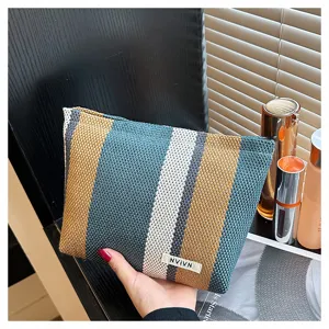 Striped canvas makeup bag portable travel cosmetic storage pouch for women daily use.