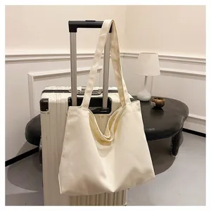 Minimalist canvas tote bag for women, stylish shoulder shopping bag for casual daily use and travel.
